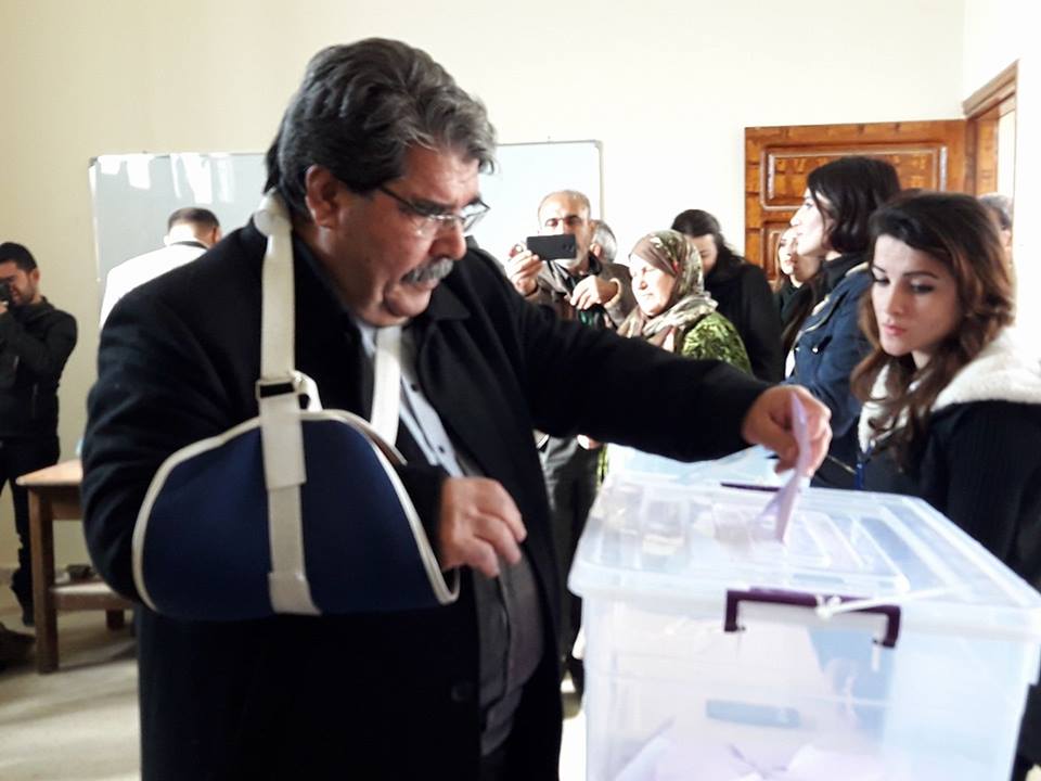 Salih Muslim, the former head of the PYD, the main Kurdish ruling party in northern Syria, casts his vote in the second round of elections in Kobani, Rojava, Syria, December 1, 2017. (Photo: Medya Kan'aan) 